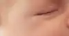 Picture of a father holding his sleeping baby