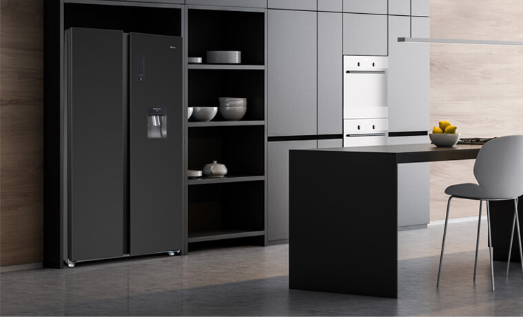 A black CHiQ fridge in a sleek modern kitchen