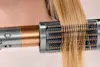 Use the spinning barrel on an airwrap of a curl.