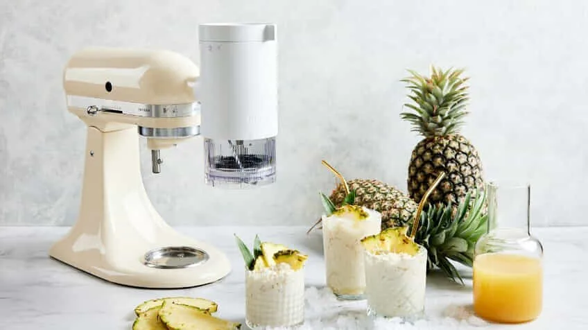 Image of the KitchenAid 66L Bowl Lift Stand Mixer in Almond Cream on a modern kitchen bench