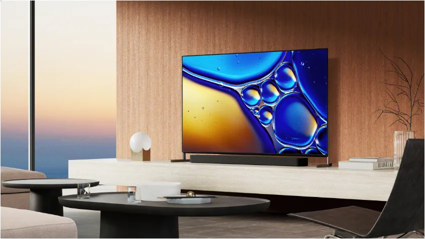 Image of the Sony BRAVIA 8 TV on the wall of a modern living room