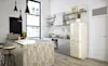Retro style cream coloured fridge in a modern industrial style kitchen