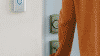 A mother and daughter using a ring doorbell