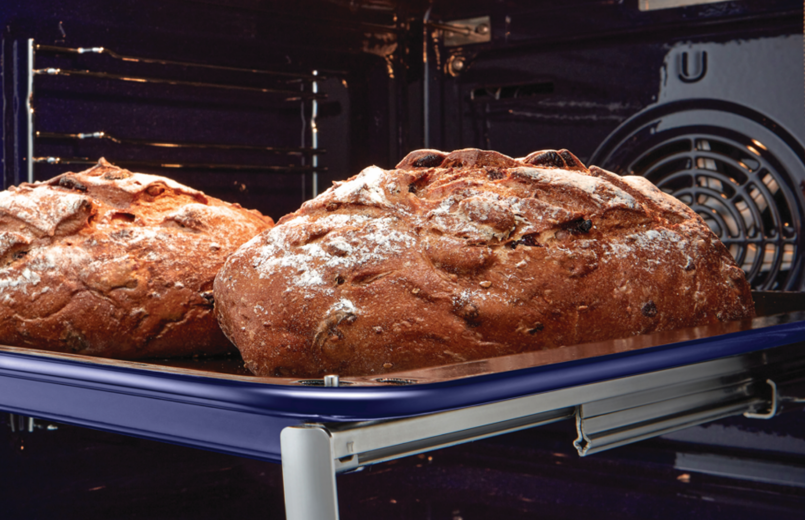 An LG Series 9 76L InstaView Full Steam Oven, Glass cooking bread. 