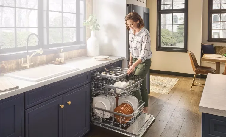 woman stacks LG QuadWash Dishwasher