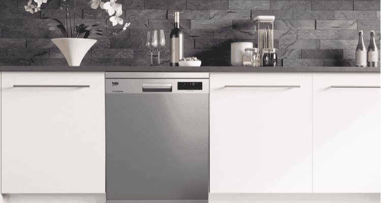 Beko stainless steel dishwasher in between white cabinetry.