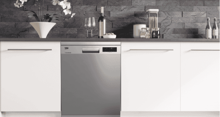 Beko stainless steel dishwasher in between white cabinetry.