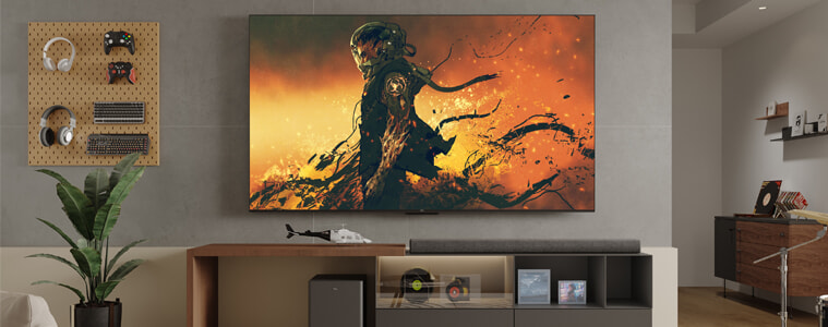 A video game character is displayed on a TCL television in a modern living room