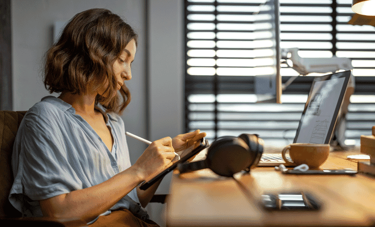 Woman sitting at her desk working