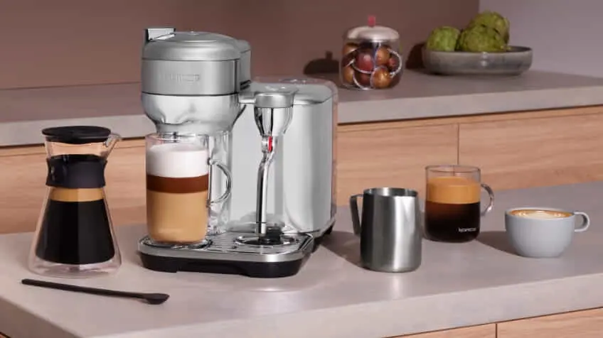 The new Nespresso Creatista coffee machine on a bench making coffee  The Good Guys