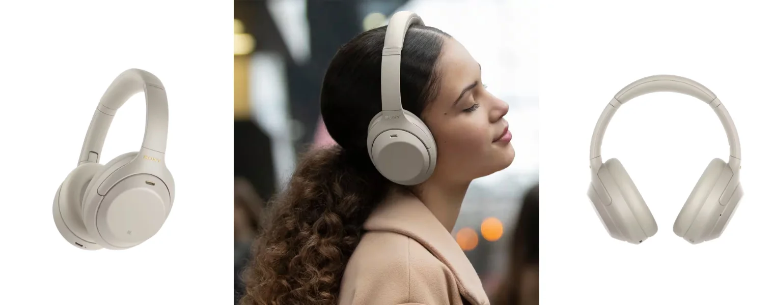 Image of woman enjoying music with the Sony Premium Noise Cancelling Headphones in Silver