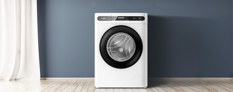 A CHiQ washing machine against a blue wall