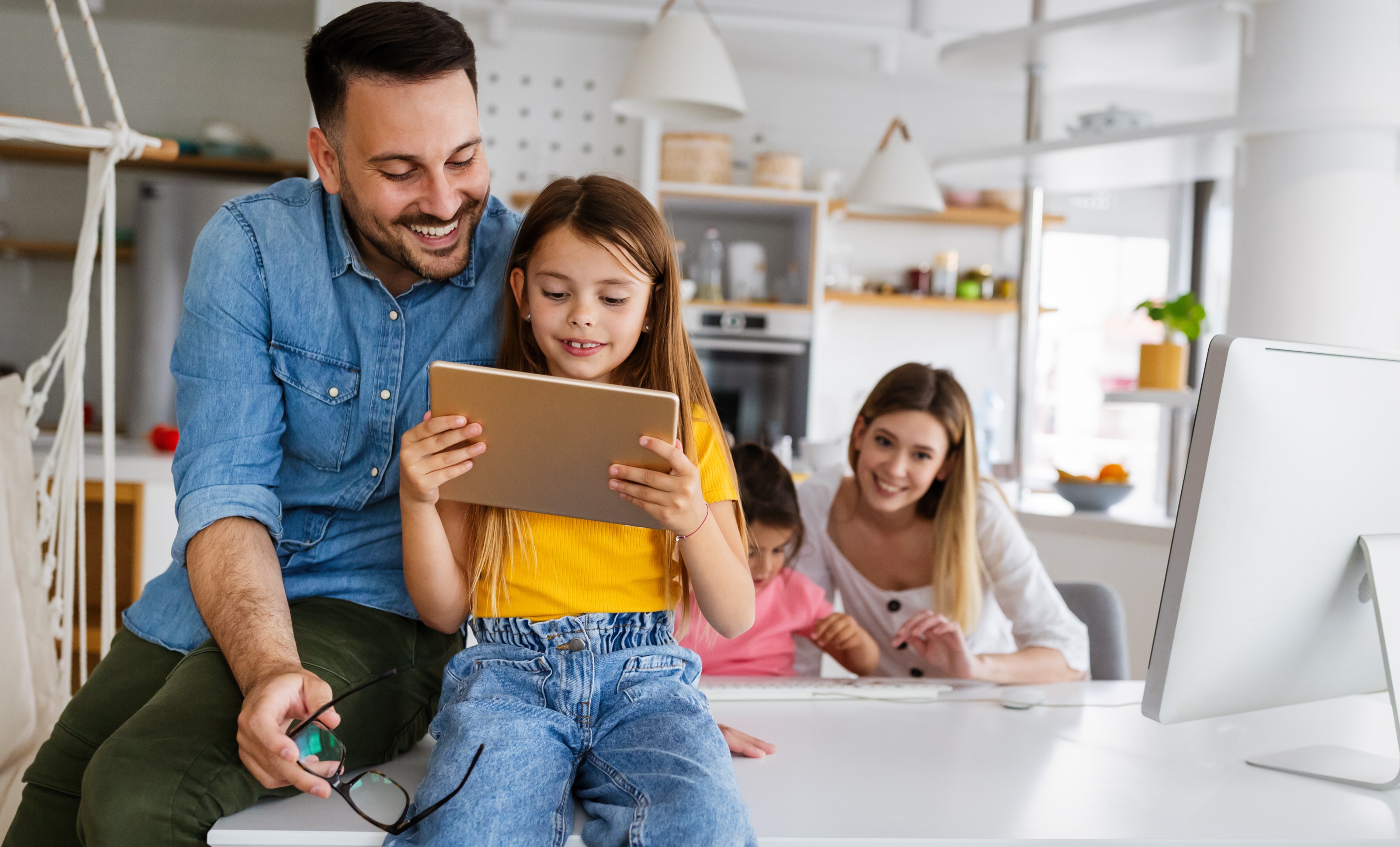 Family using their tech at home