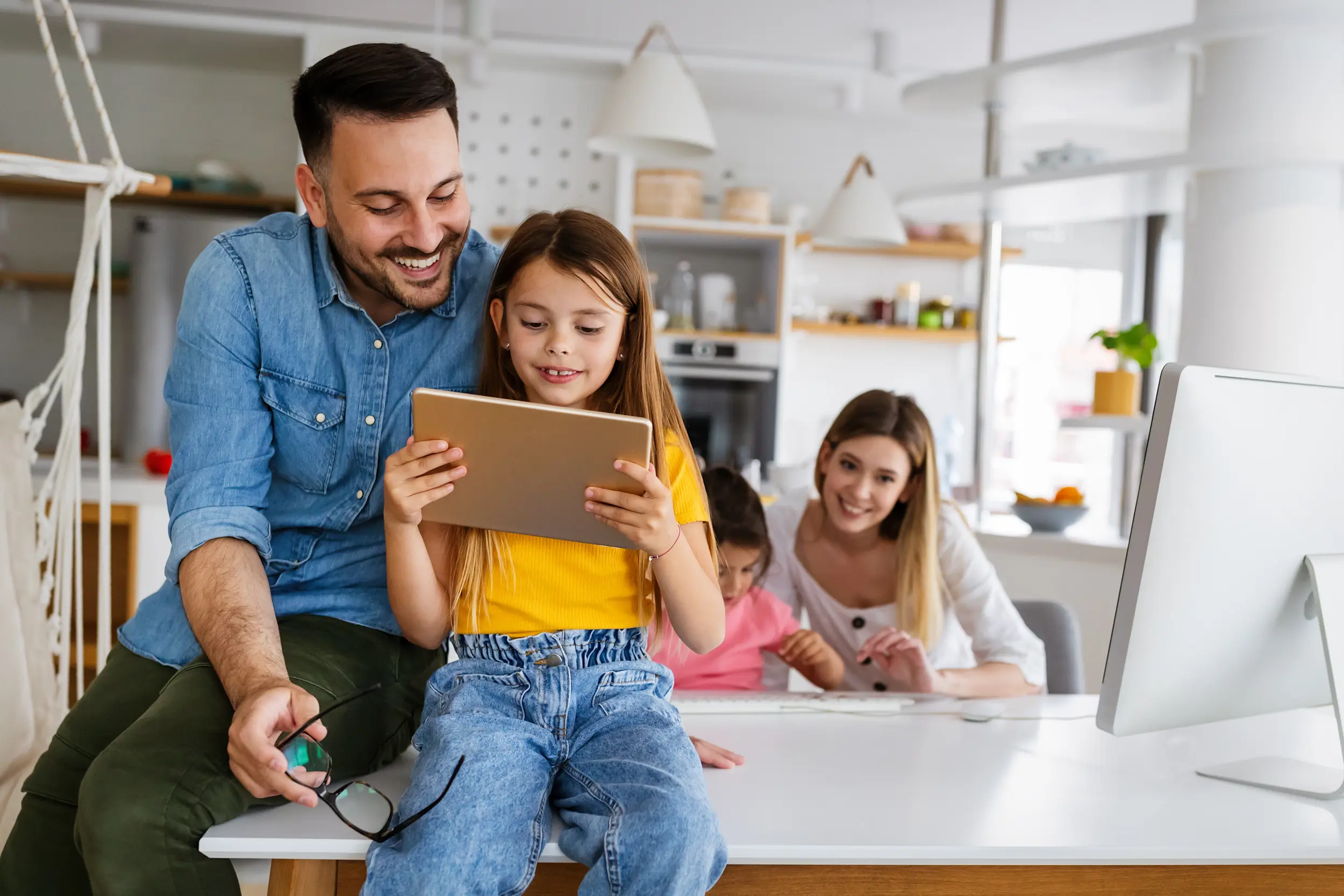 Family using their tech at home