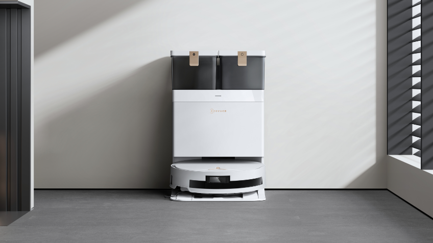 Sleek Robot Vac from ECOVACS in charging doc which mops and vacuums