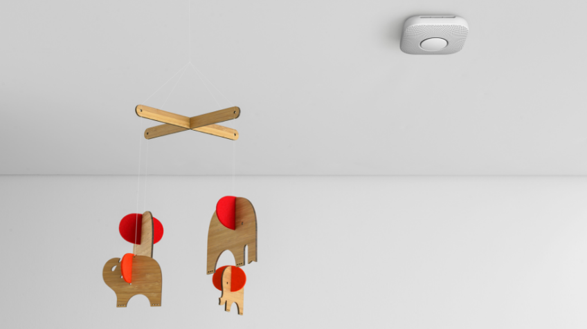 Image of the Google Nest Protect smoke alarm on the ceiling of a child's room