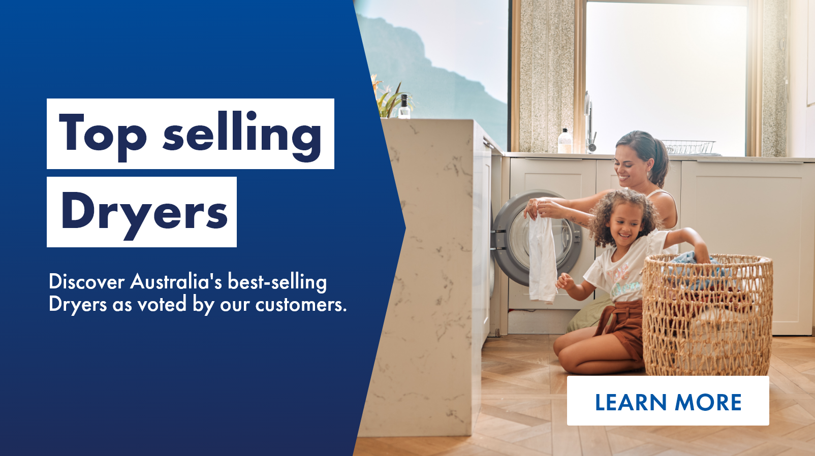 Top selling dryers: mother and daughter unloading clean laundry from a front load dryer
