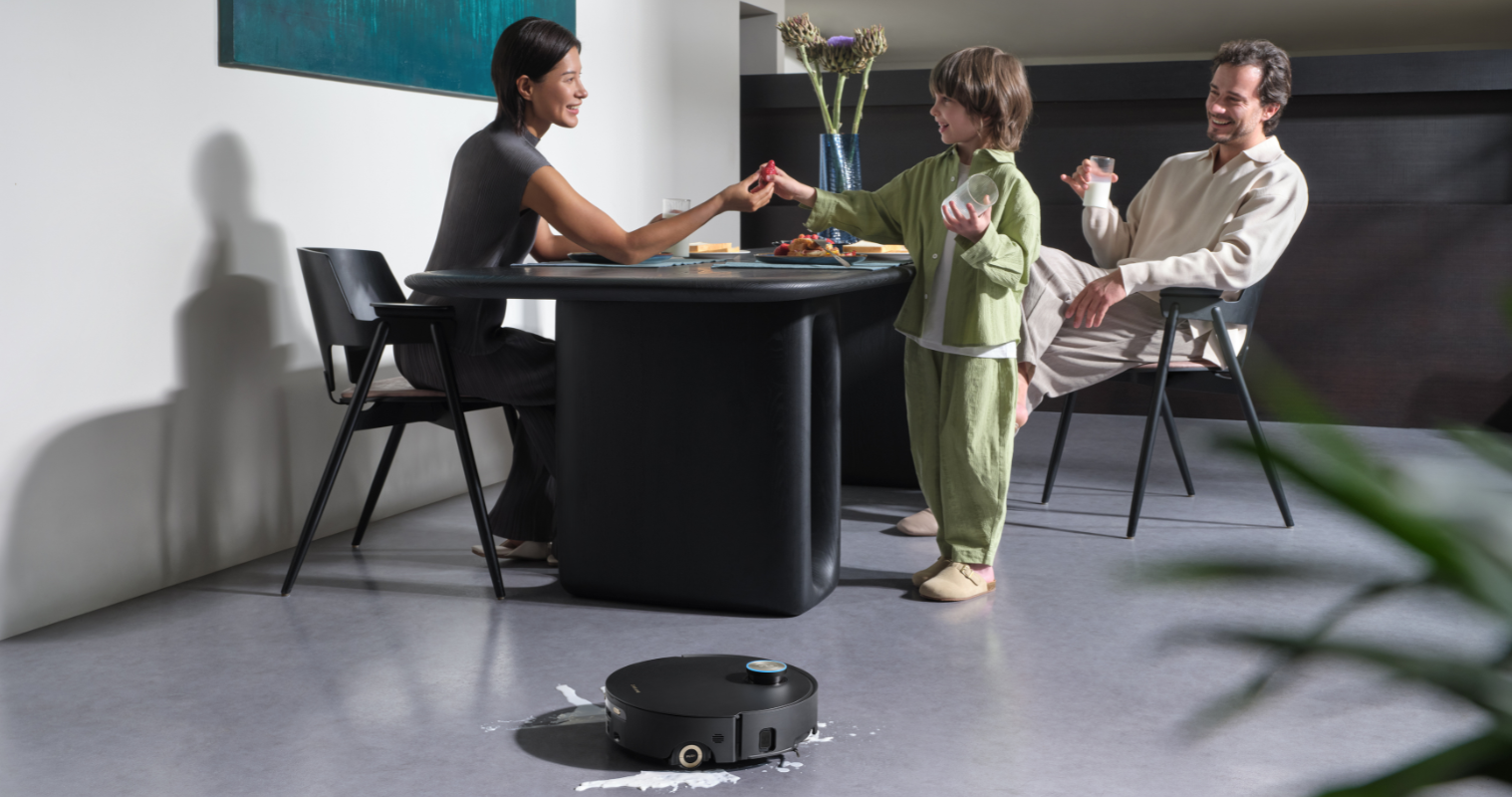 Dreame Aqua 10 Ultra Roller mopping up a childs spilt milk. 