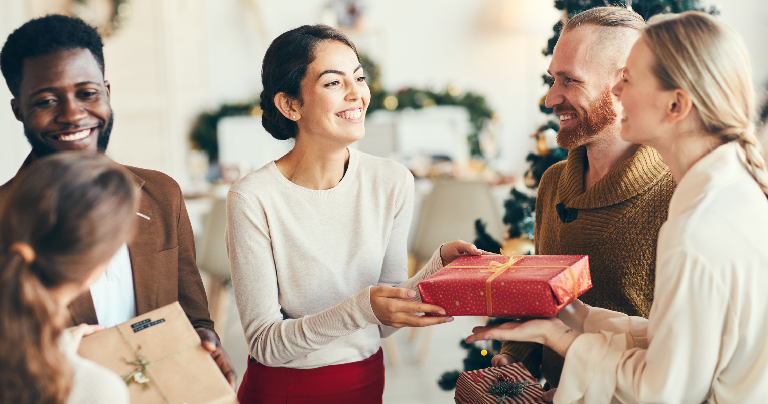 Image of people exchanging Christmas gifts