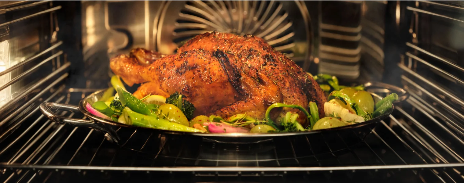 Image of a chicken cooking in an Electrolux Steam Oven