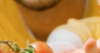 Image of a child and father looking inside a fridge.