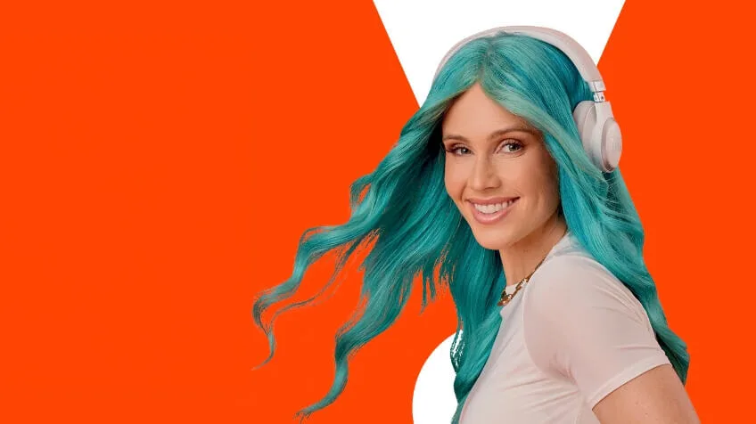 woman wears JBL headphones