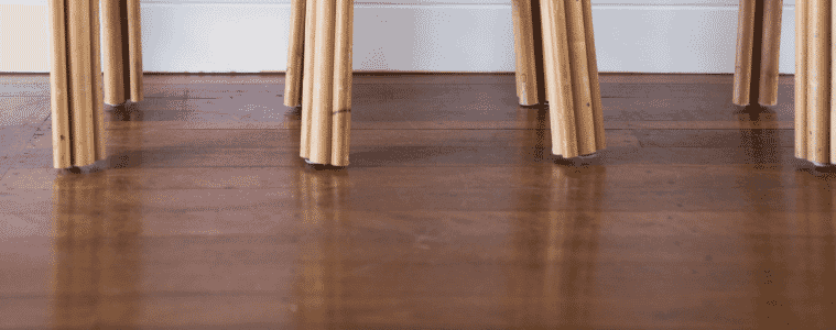 Closeup of walnut coloured timber flooring 