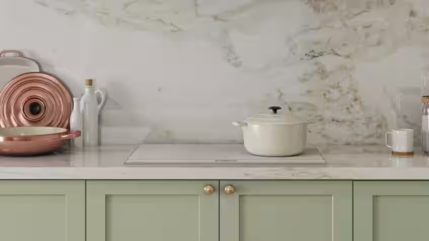 White induction cooktop from samsung on white marble bench