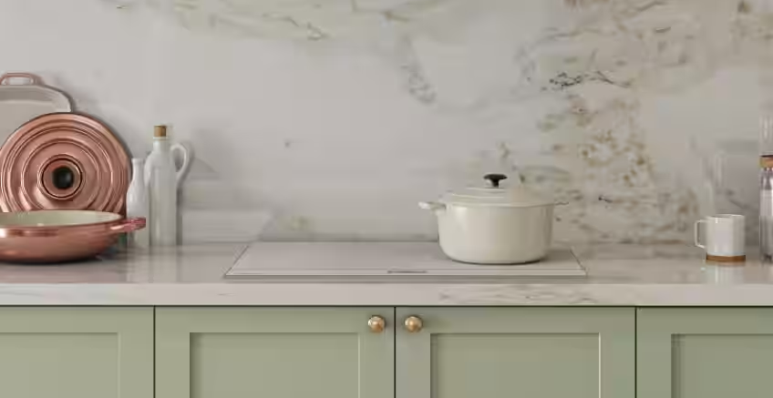 White induction cooktop from samsung on white marble bench