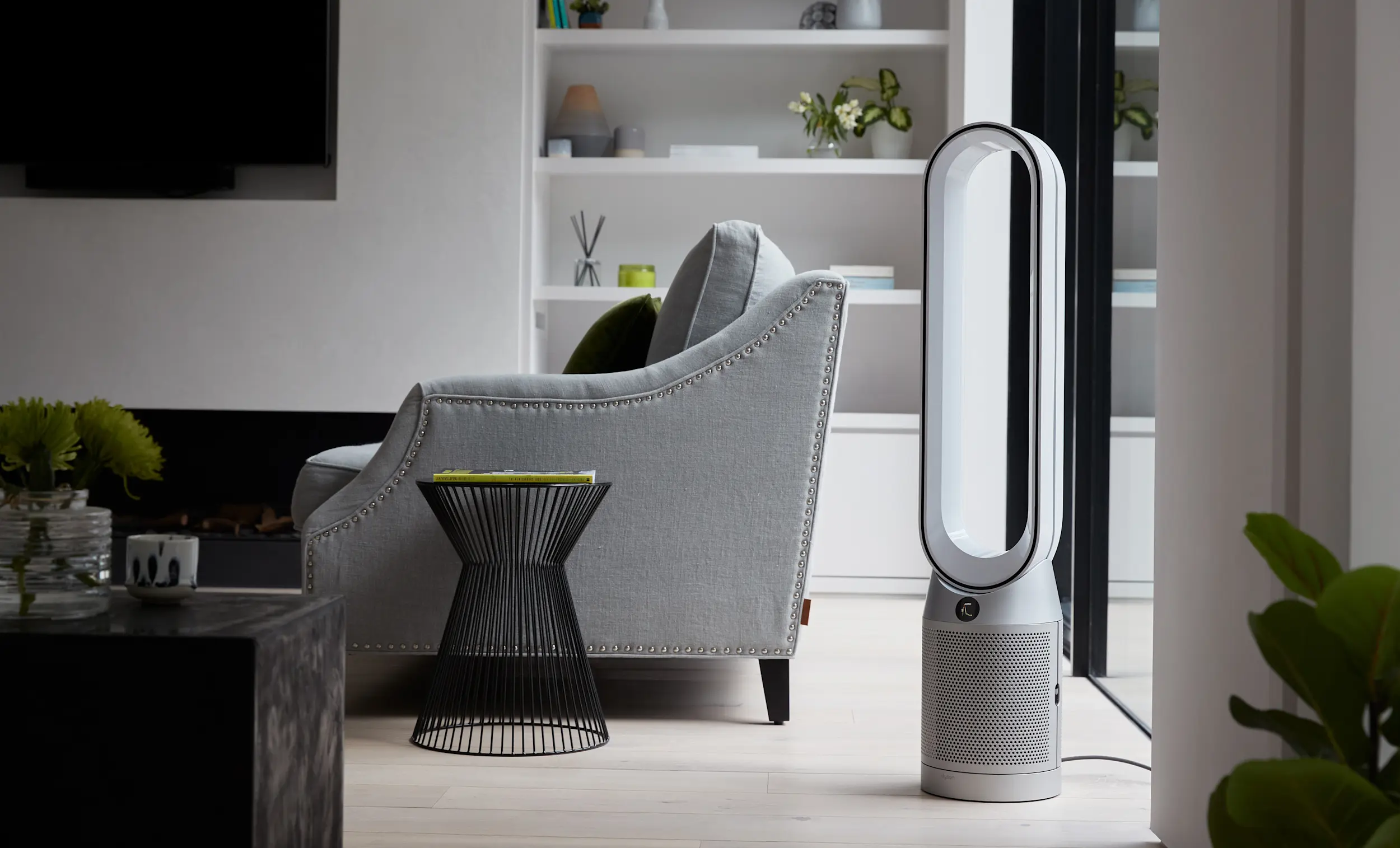 A Dyson air purifier purifies a modern living room