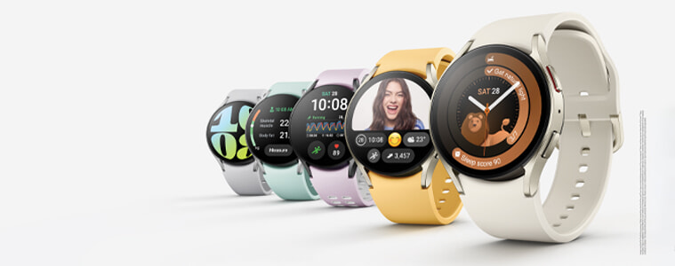 The Samsung Galaxy Watch6 is lined up with the different coloured watch bands From left to right White mint lavender yellow and beige