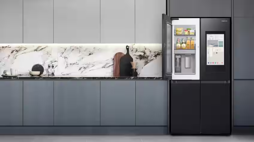 The top left door of a Samsung French door fridge is open revealing the Beverage Centre
