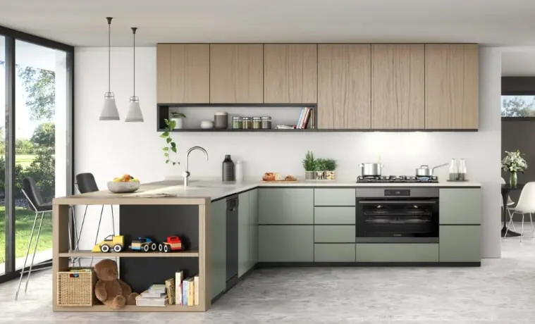 A blonde timber and sage green Lshaped kitchen