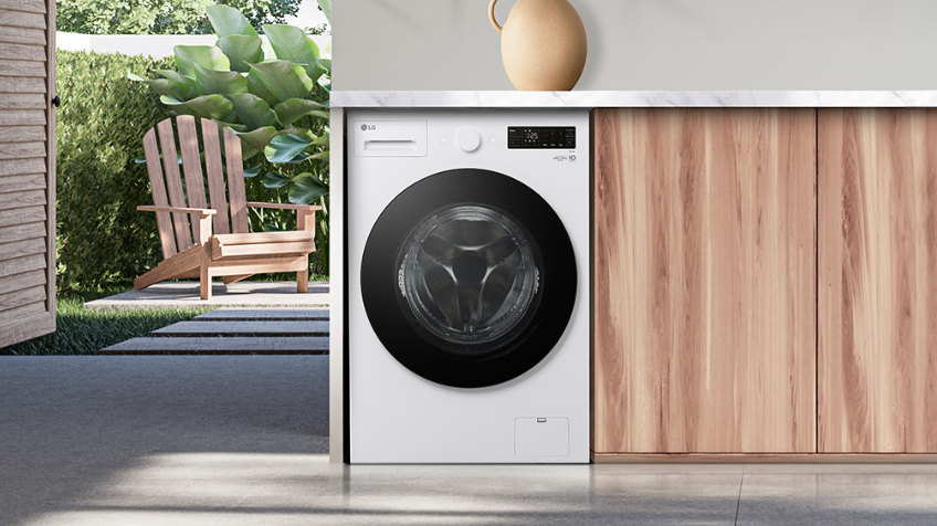 LG 14kg XL Capacity Front Load Washing Machine in laundry room
