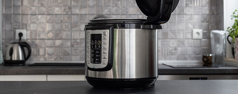 Modern multi cooker in a kitchen open and ready to cook