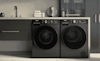 Hisense new series 7 washer and dryer in black next to each other in modern Landry 