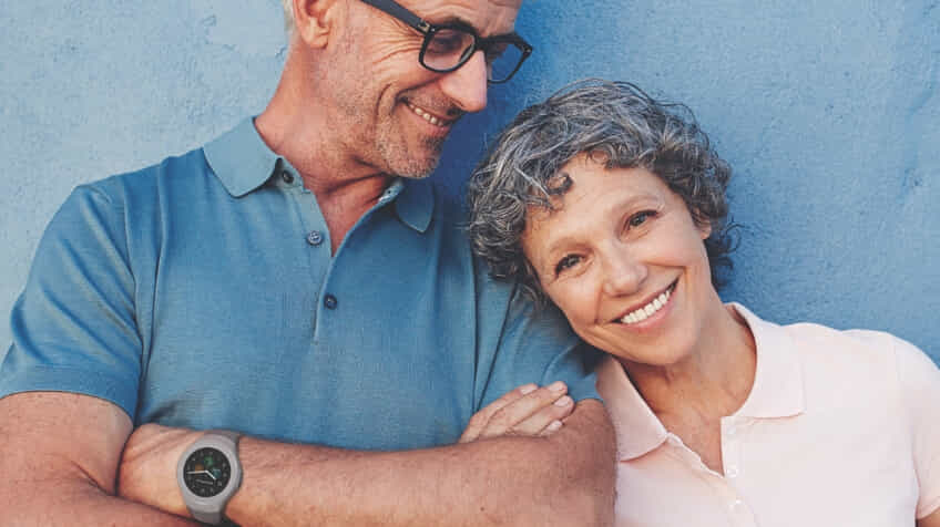 Elderly couple together with their Spacetalk Life watches on
