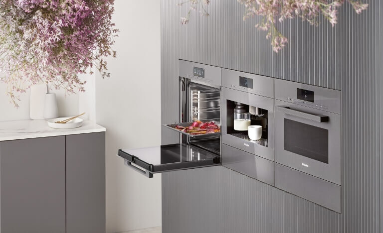 Modern kitchen with three Miele ovens