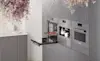 Modern kitchen with three Miele ovens