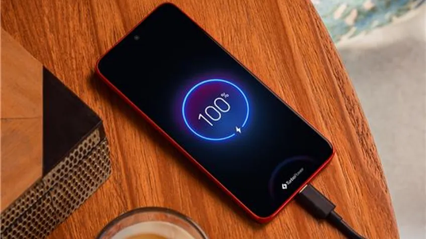 Motorola phone charging on table