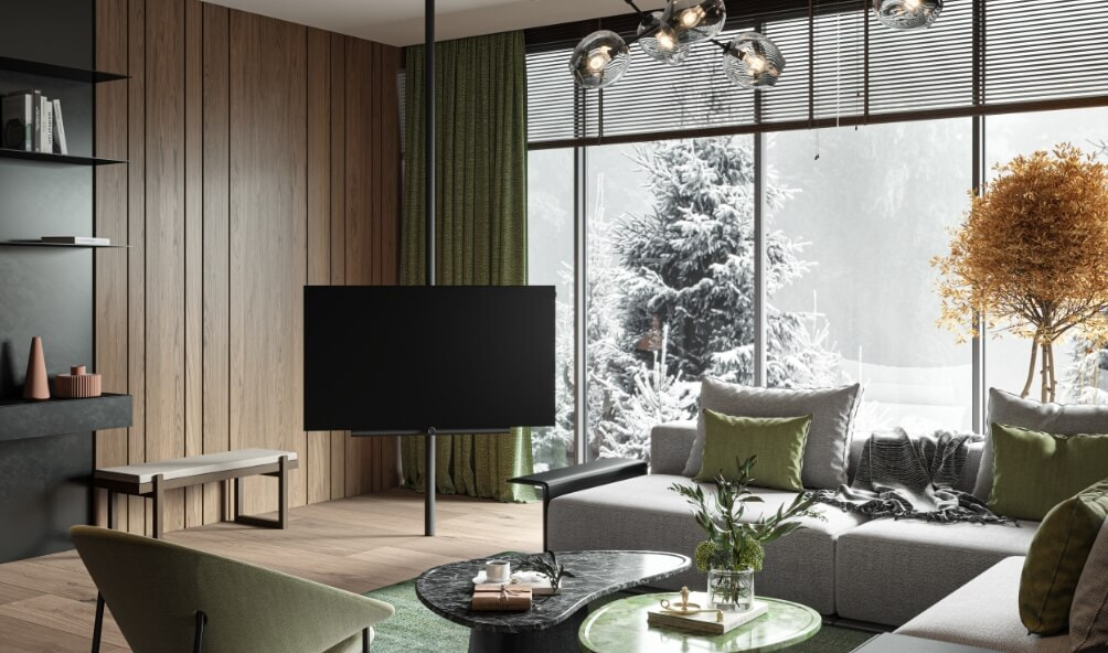 The LOEWE Bild TV range showcased in modern lounge room looking onto snowy outdoor area