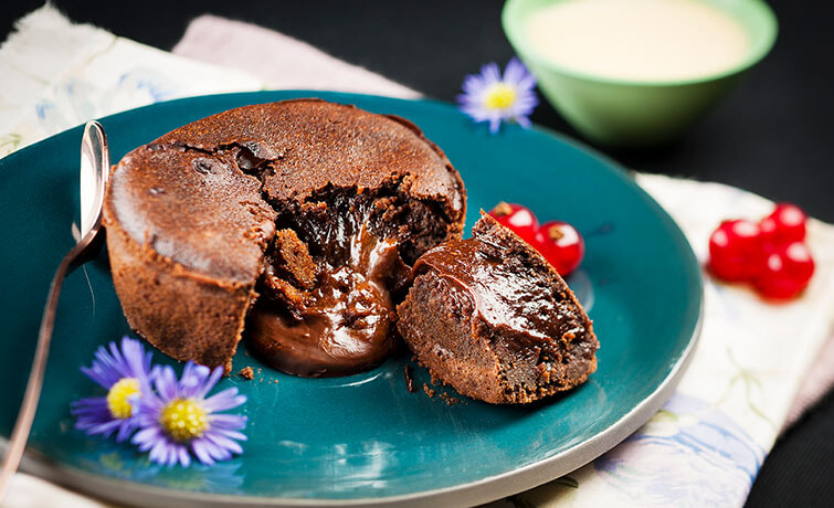 Delicious rich Molten Chocolate Pudding on a blue plate