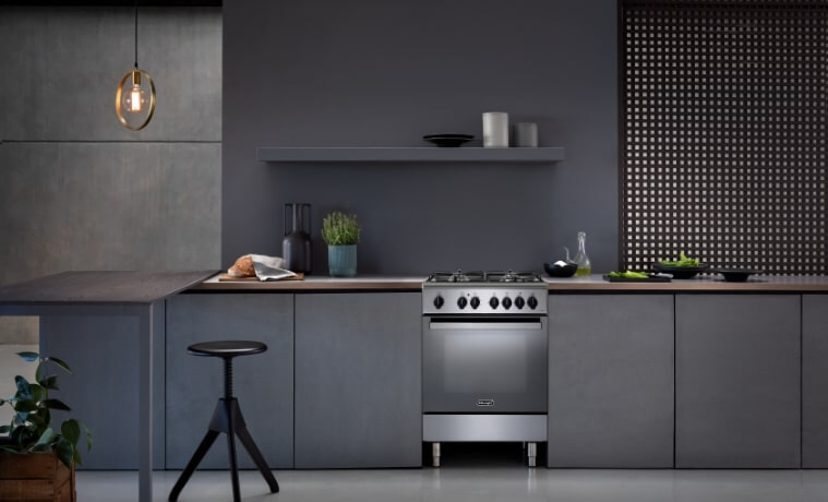 A small black monochrome kitchen