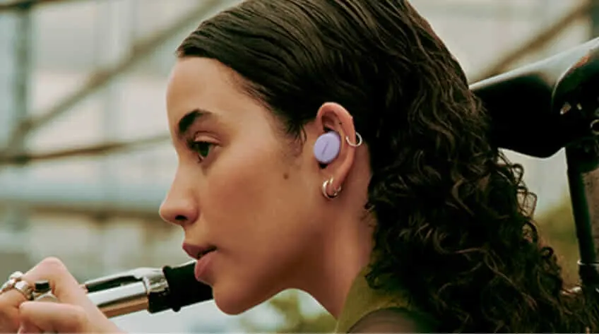 woman wearing Bose QuietComfort Earbuds