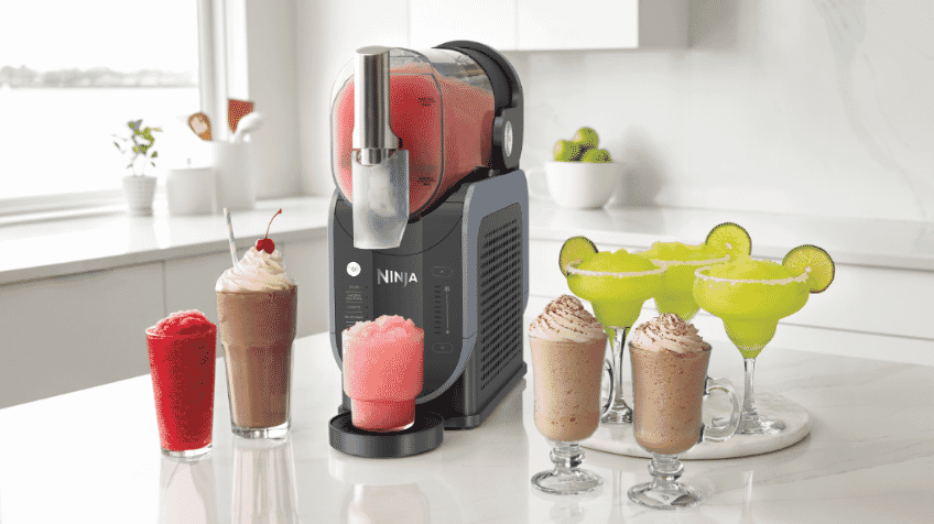 Ninja Slushi Professional Frozen Drink Maker surrounded by frozen drinks