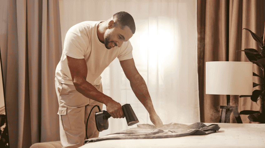 Man uses Braun steam station