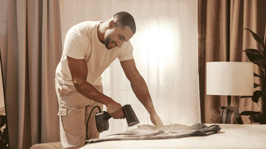 Man uses Braun steam station