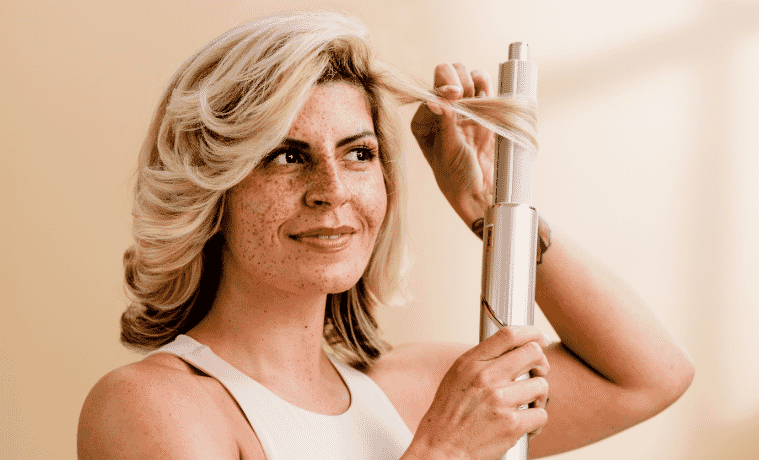 a woman using her Shark Beauty FlexStyle Air Styling  Drying system 