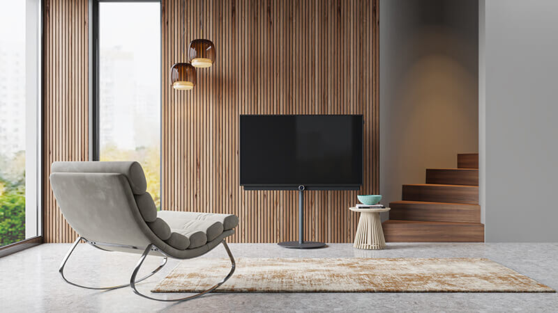 A stunning Loewe TV as the centerpiece of a modern minimalist living area