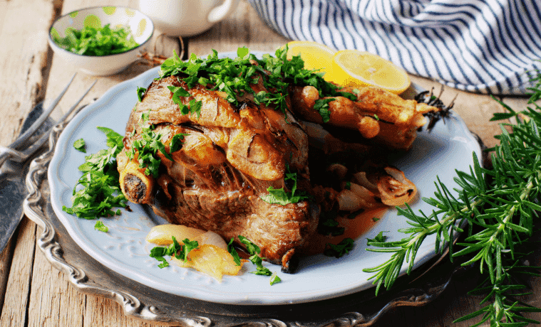 A delicious steam toast lamb shoulder on a baby blue plate